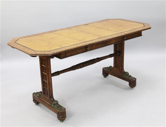 A William IV ebony strung pollard oak library table